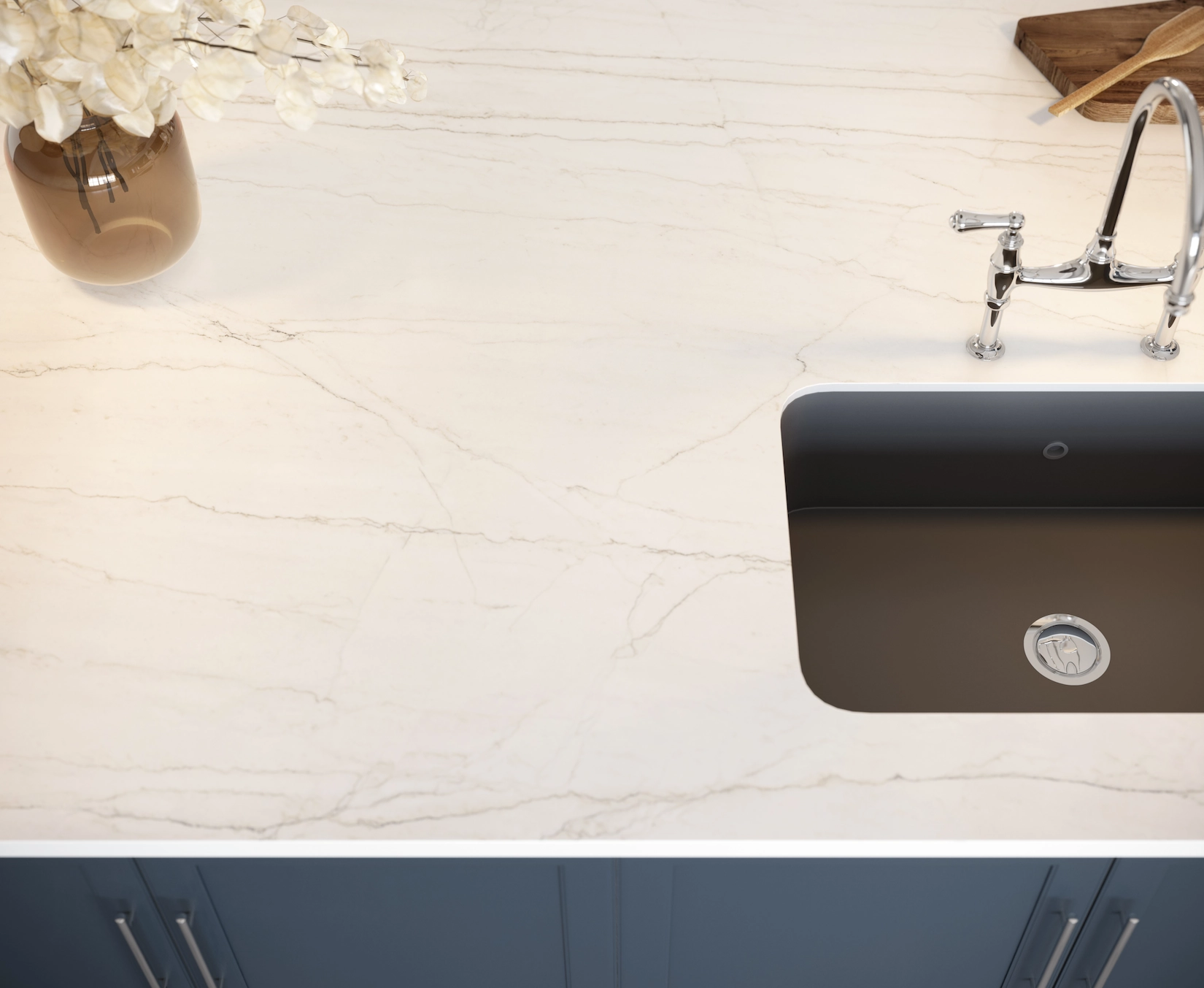 Marble worktop with undermount sink and navy shaker cabinets