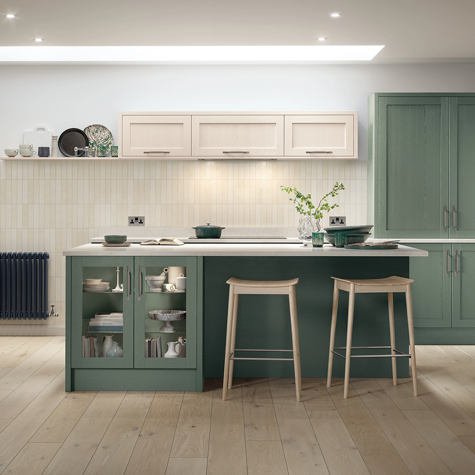Green shaker kitchen with island and glazed display cabinets