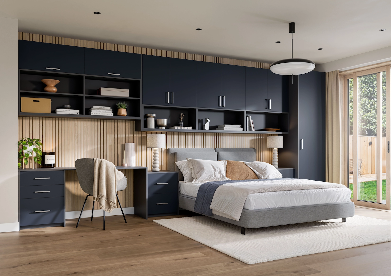 Navy fitted bedroom furniture with desk and slatted panelling