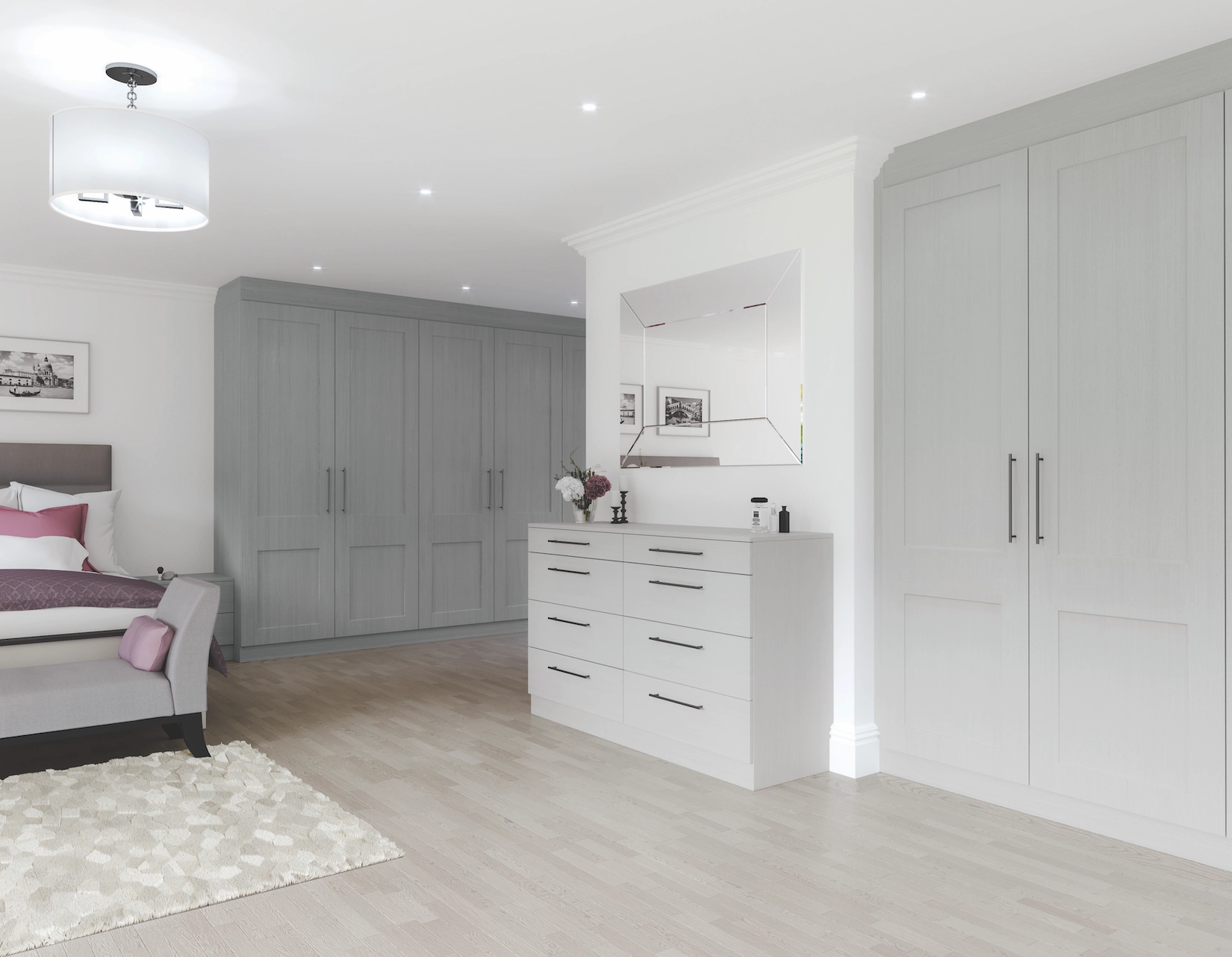 Grey fitted wardrobes with chest of drawers in a bedroom