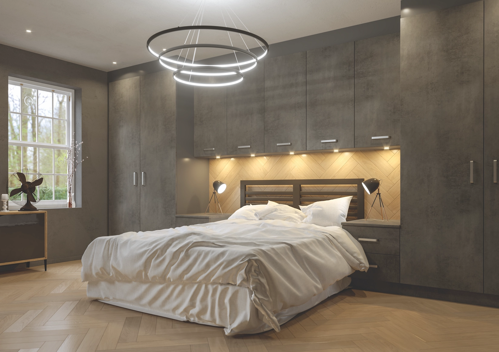 Dark fitted wardrobes with lit headboard and ring pendant