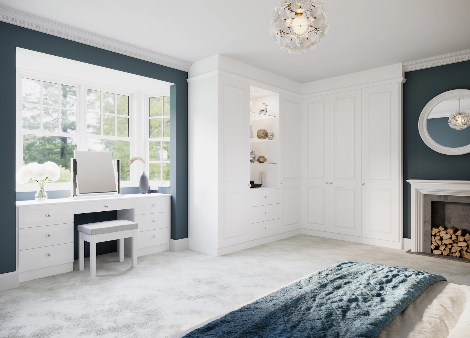 White fitted wardrobes with dressing table and fireplace