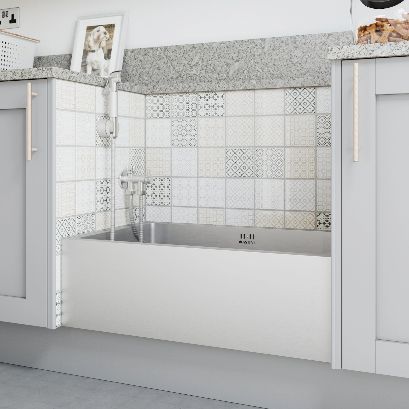 Utility room with bath, patchwork wall tiles and grey cabinetry