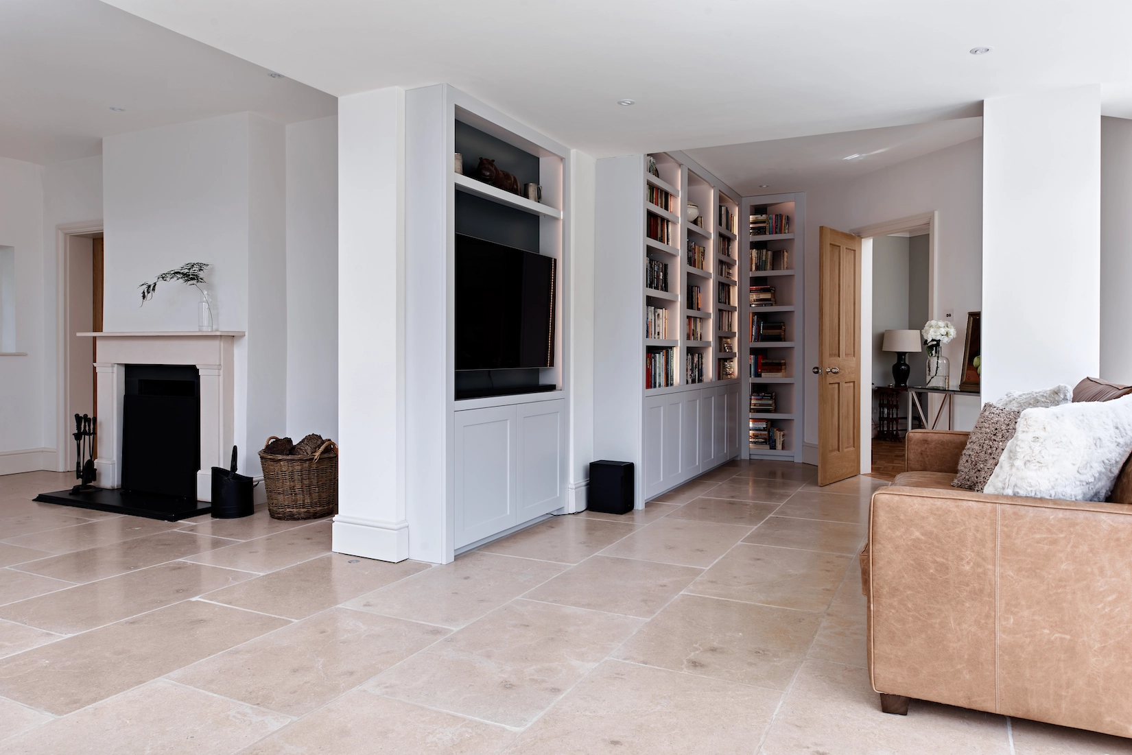 Living room media wall with television and fitted storage