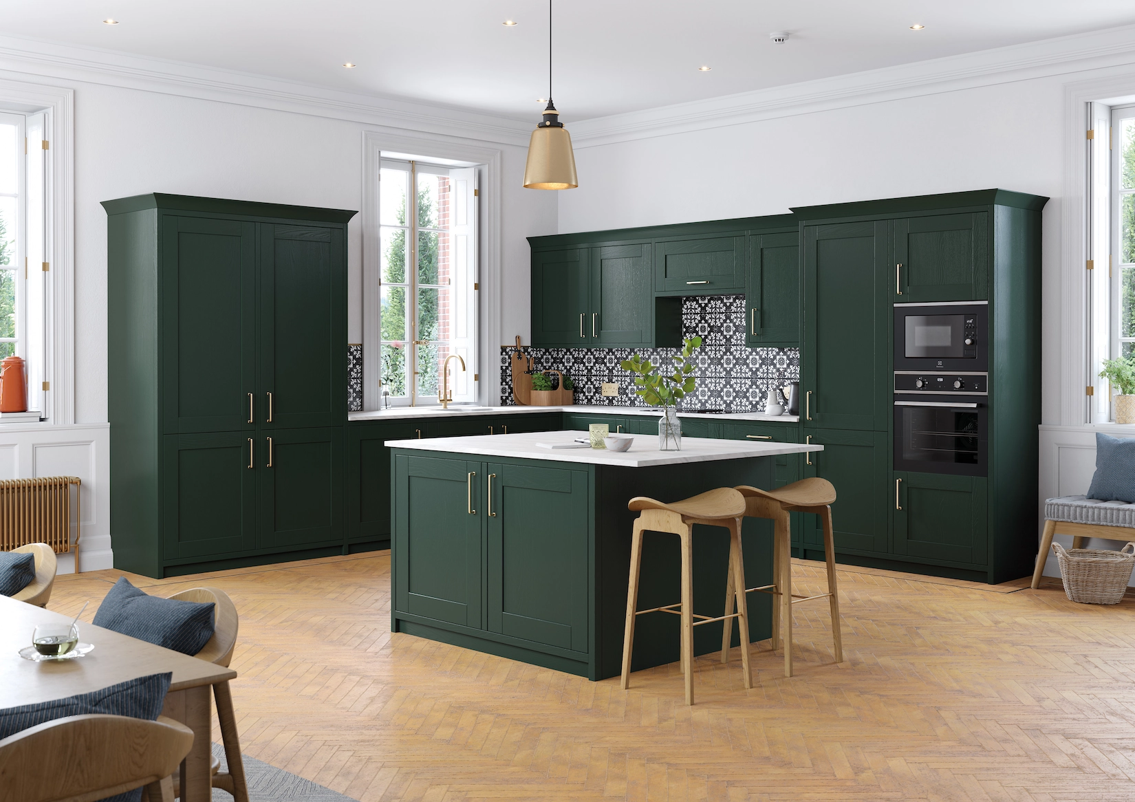 Dark green shaker kitchen with island and patterned splashback