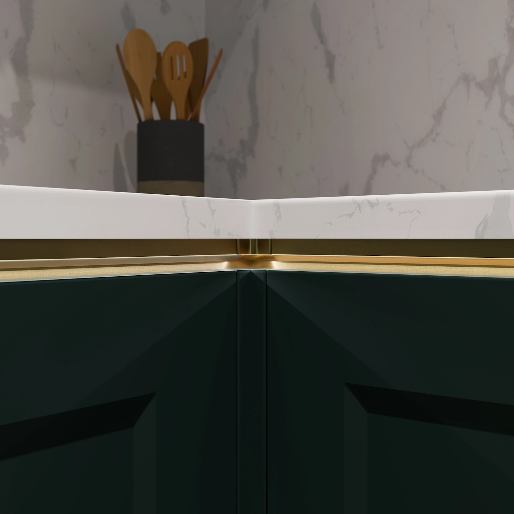 Green handleless cabinets with brass trim and marble worktop