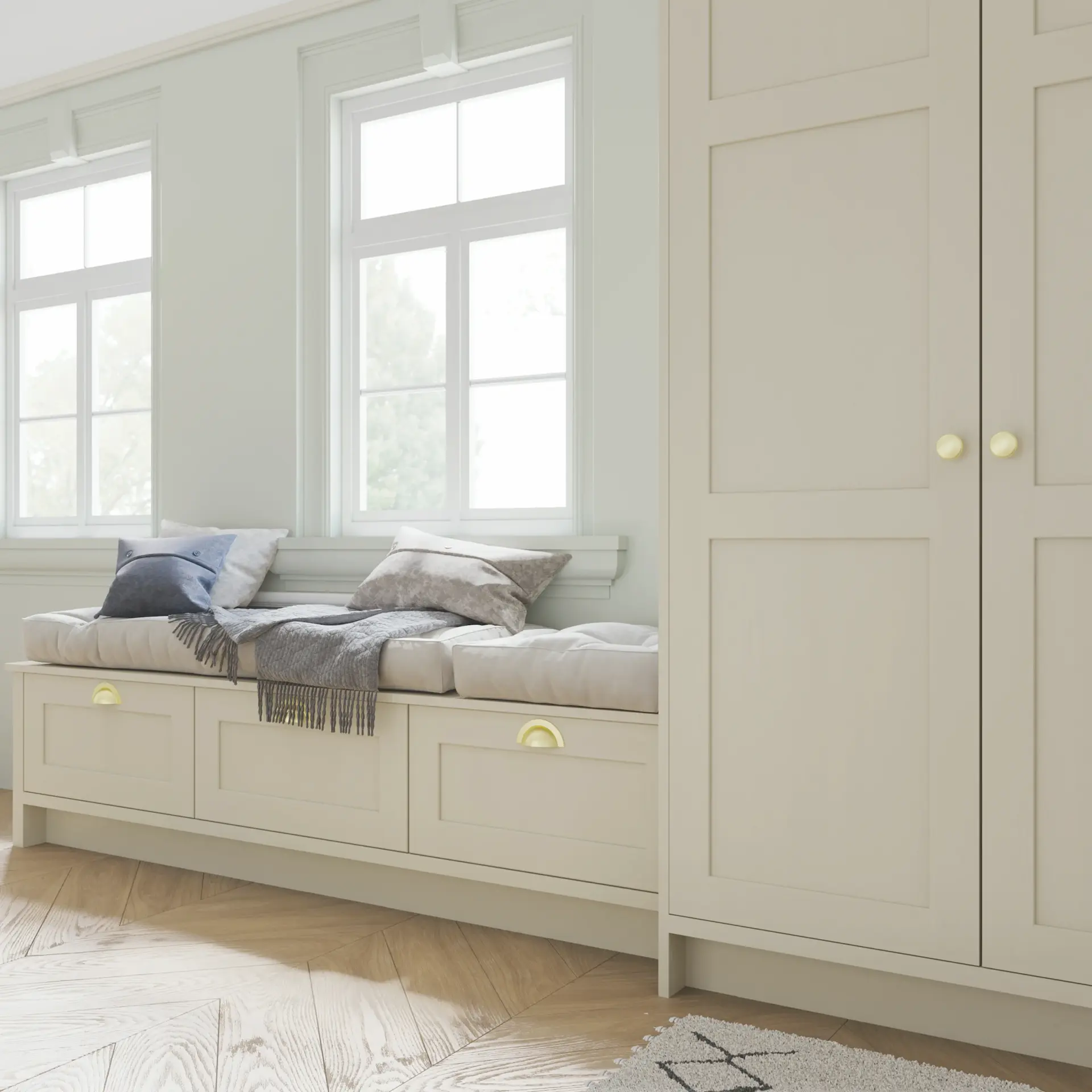 Window seat with fitted storage drawers and cream cabinetry