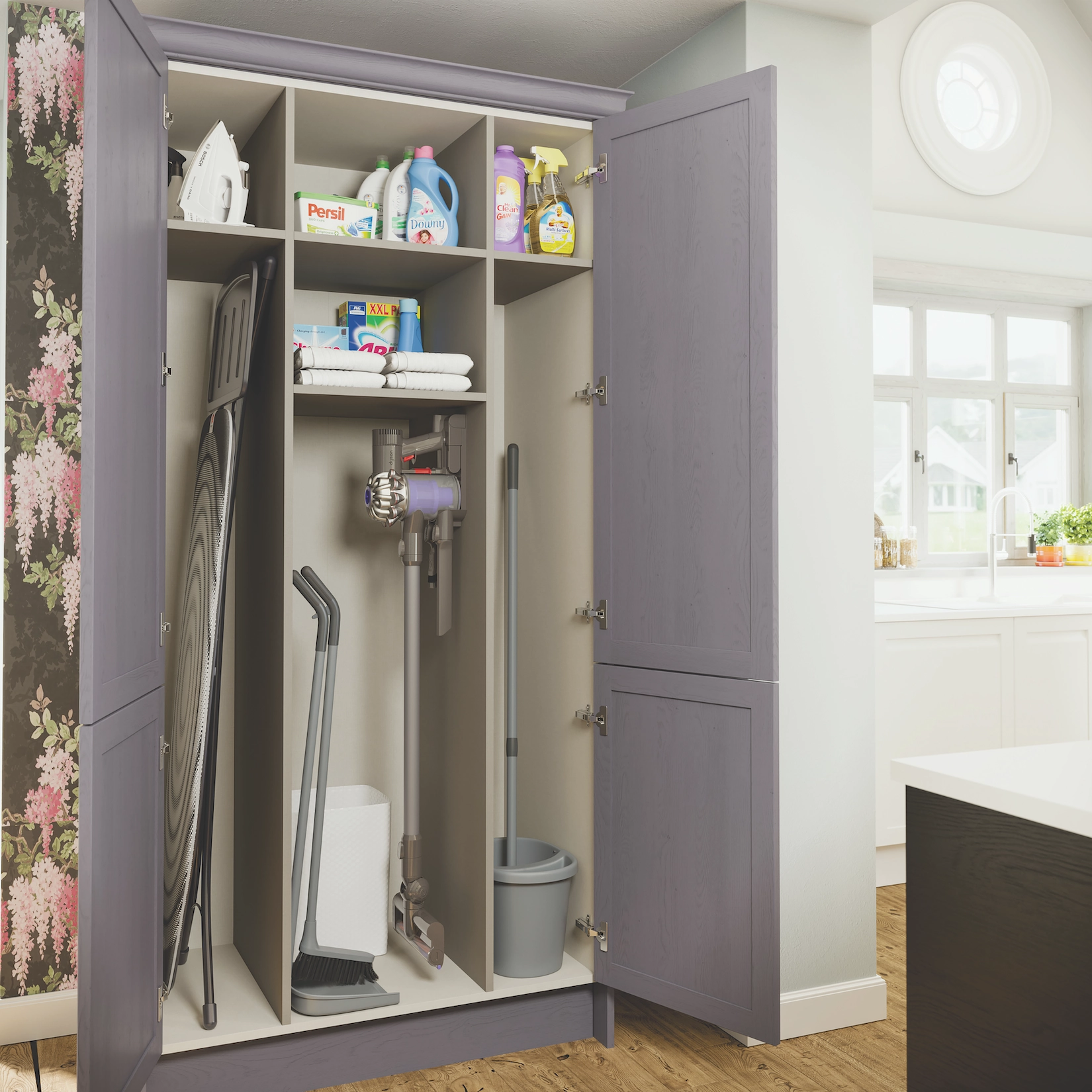 Fitted utility cupboard with cleaning storage and ironing board