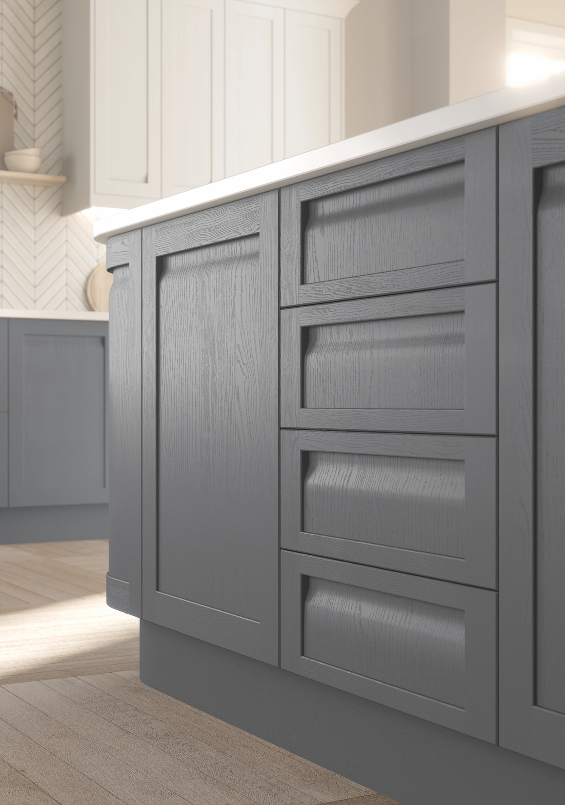 Grey cabinet drawers with recessed handleless detailing