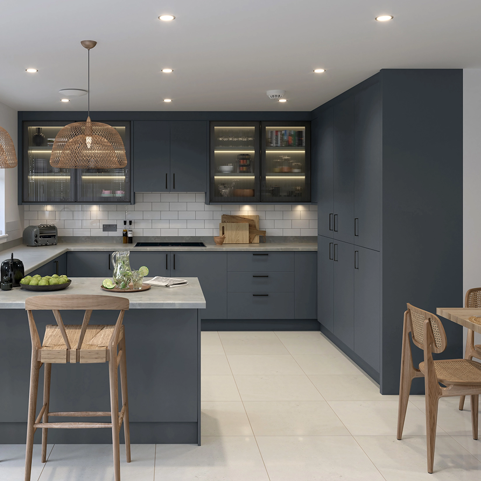 Blue slab kitchen with peninsula and woven pendant lights