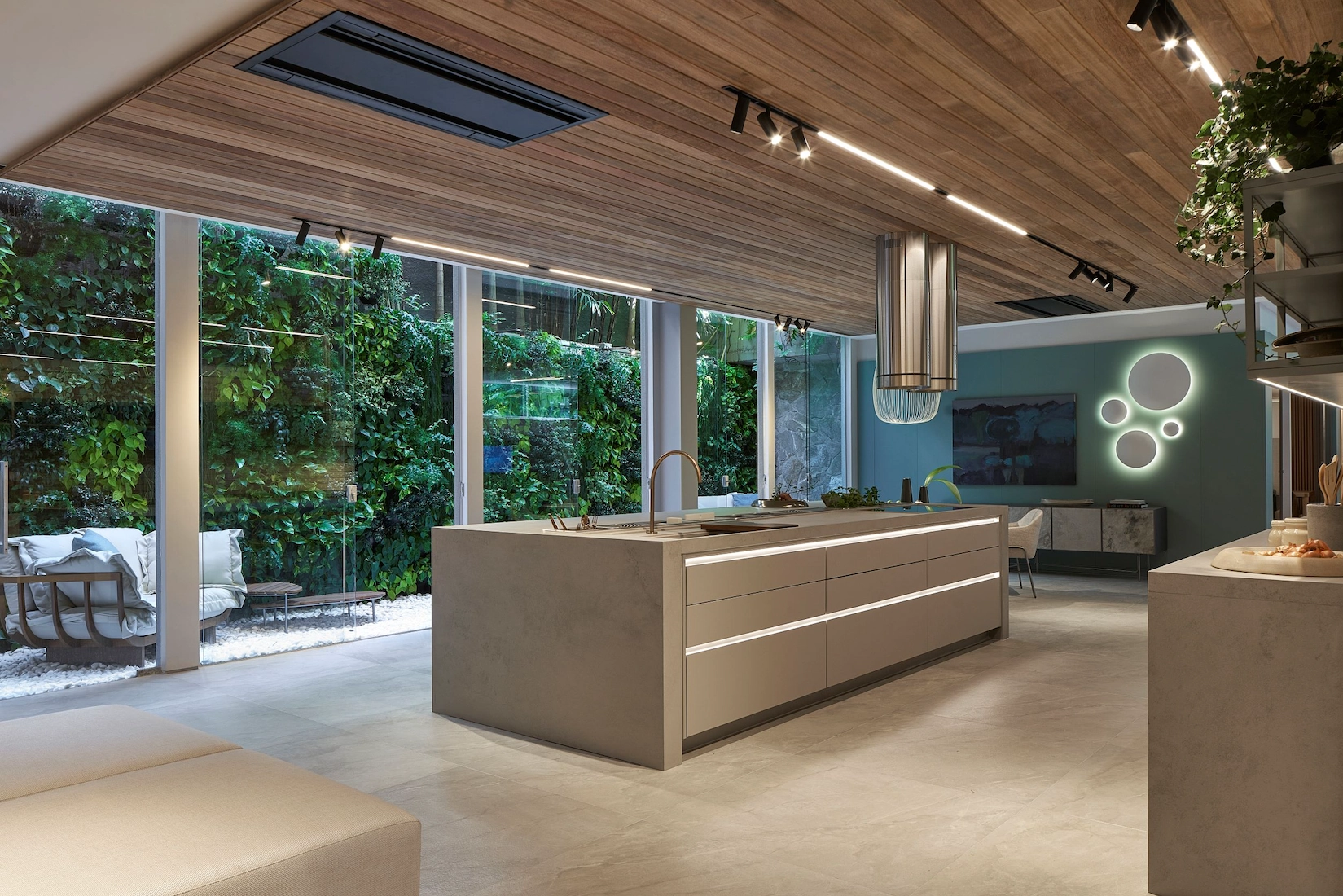 Handleless kitchen with timber ceiling and garden glazing