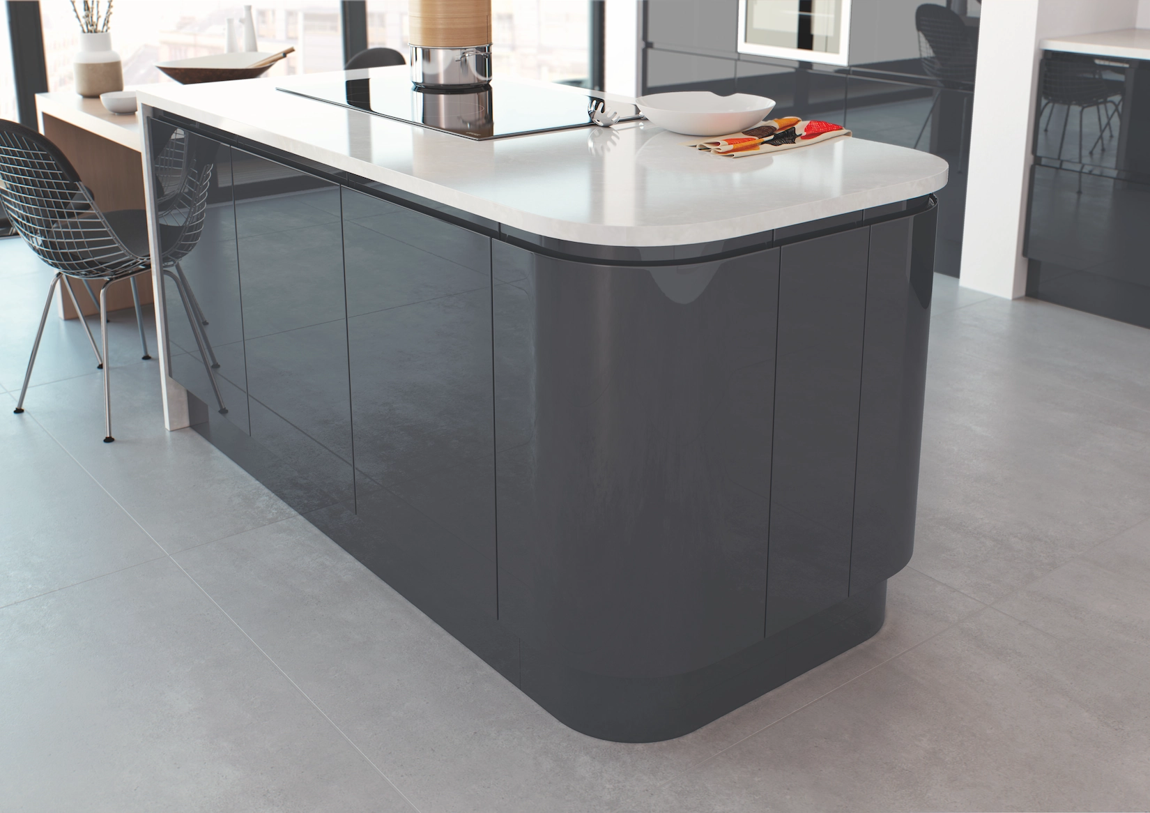 Dark grey handleless kitchen with curved island