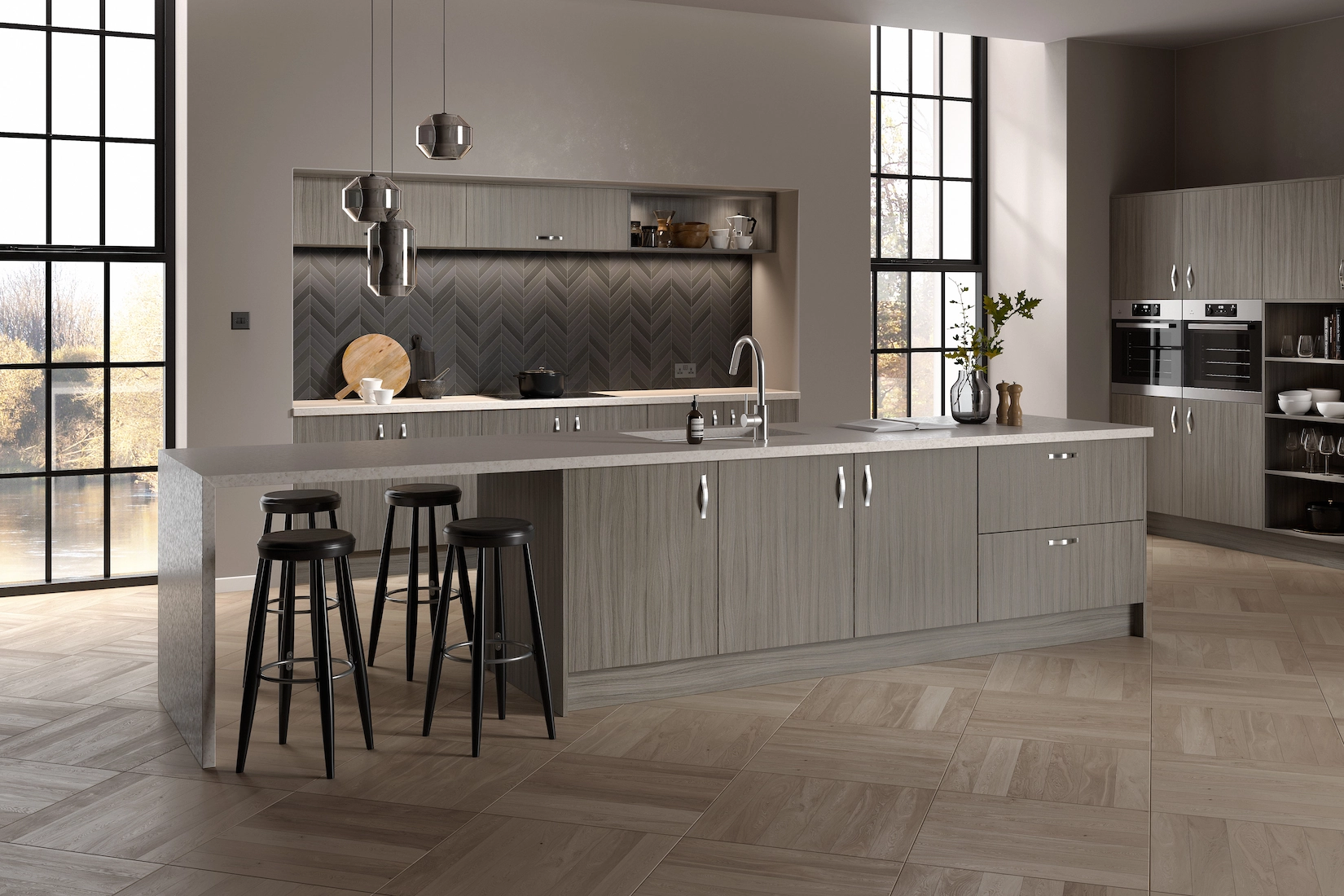 Stone slab kitchen with breakfast bar and herringbone flooring