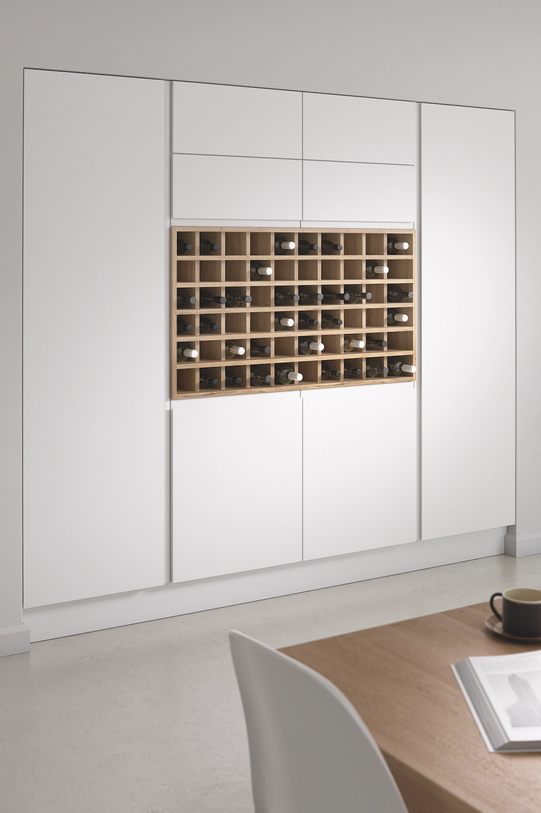White handleless tall units with built-in wine rack