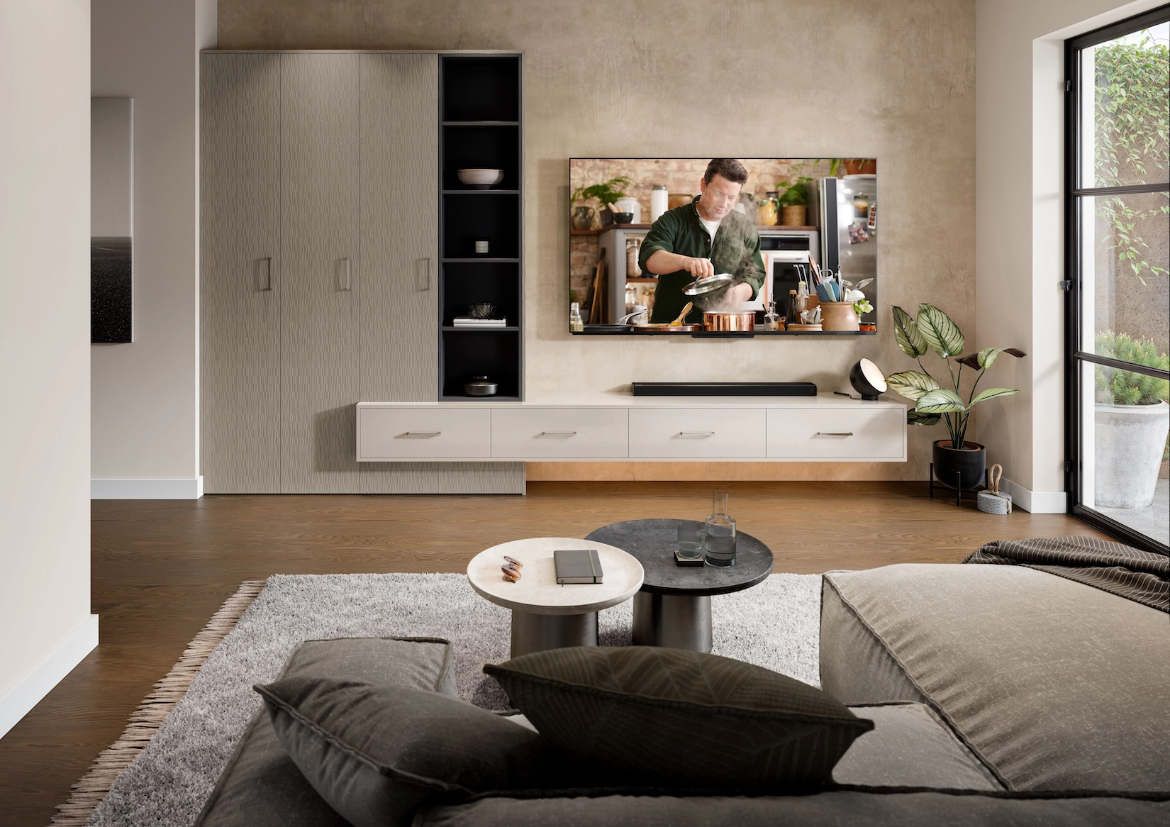 Media wall with fitted storage cupboards and television