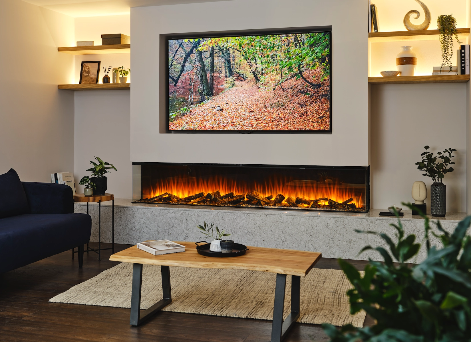 Media wall with electric fire, television and floating shelves