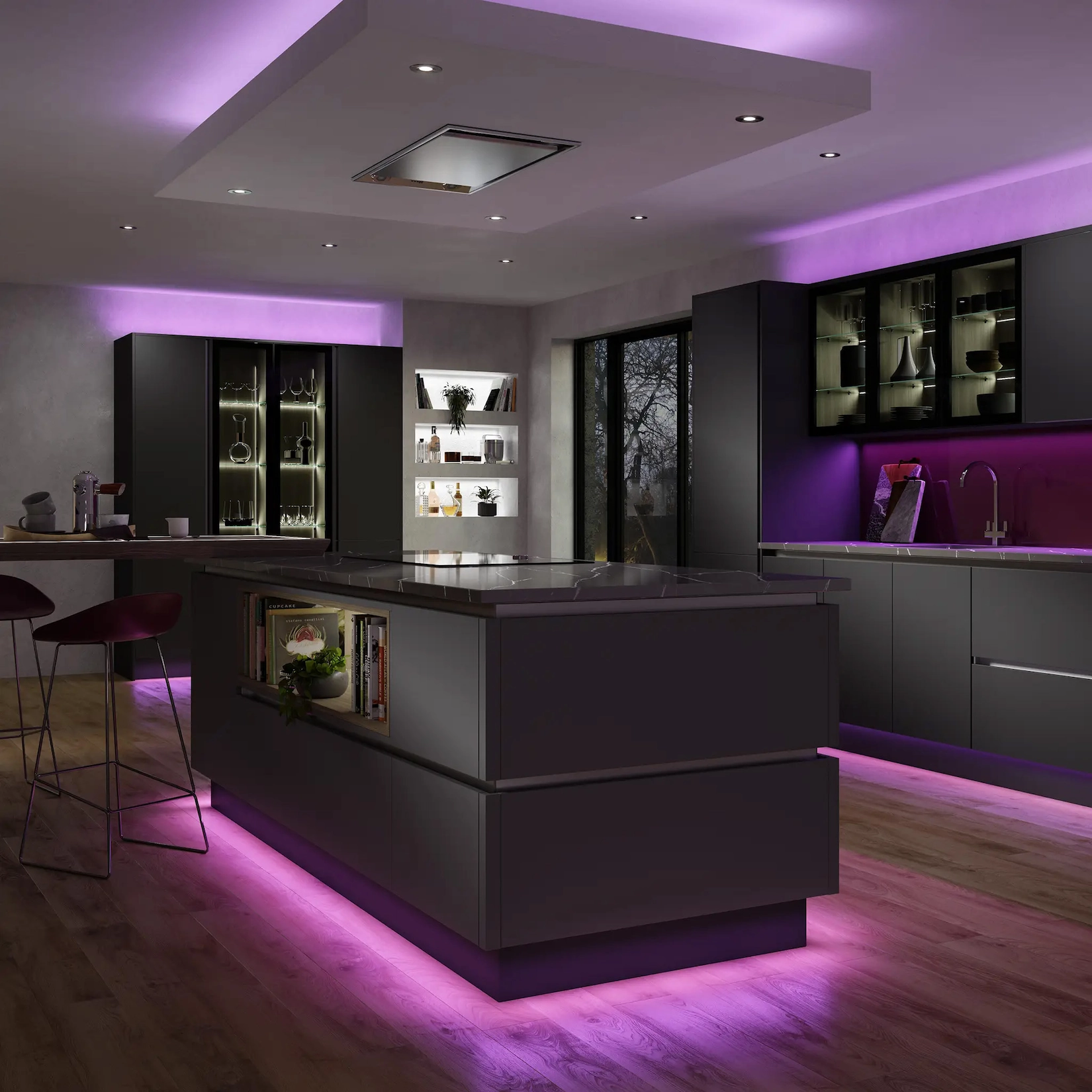 Dark handleless kitchen with coloured LED accent lighting