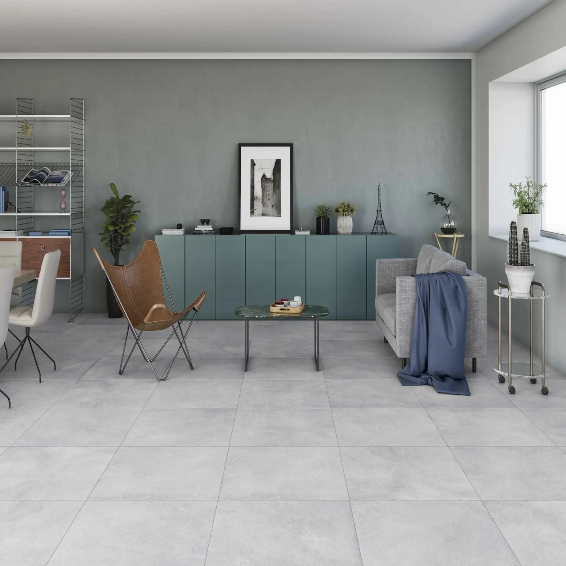 Living space with low sage sideboards and large format floor tiles