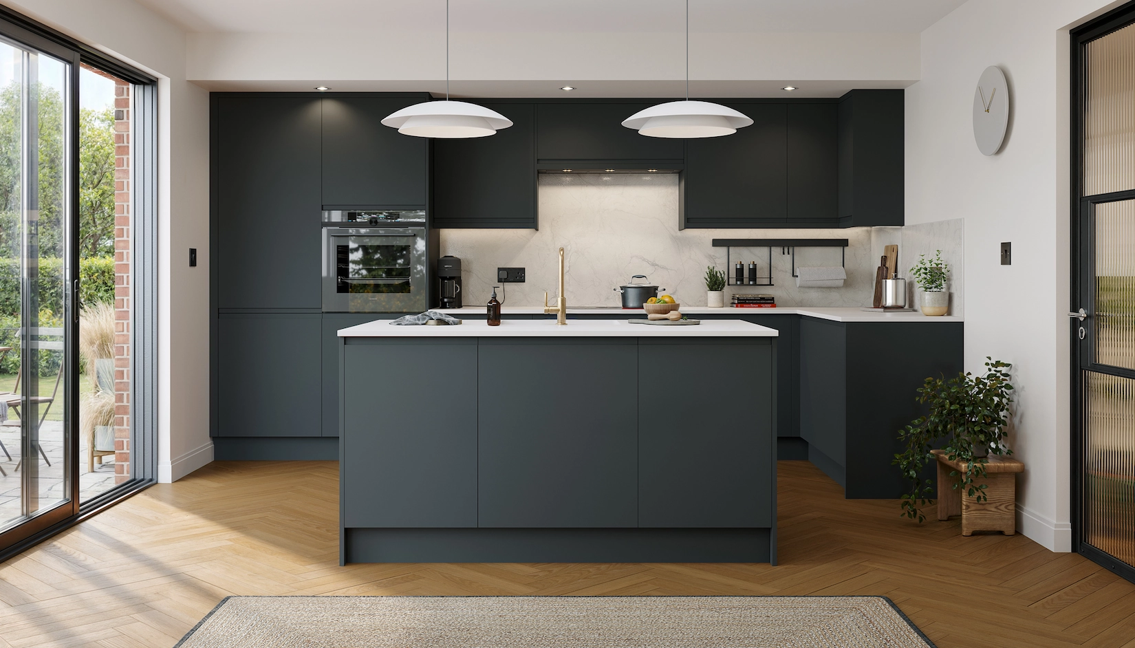 Dark grey handleless kitchen with island and garden doors