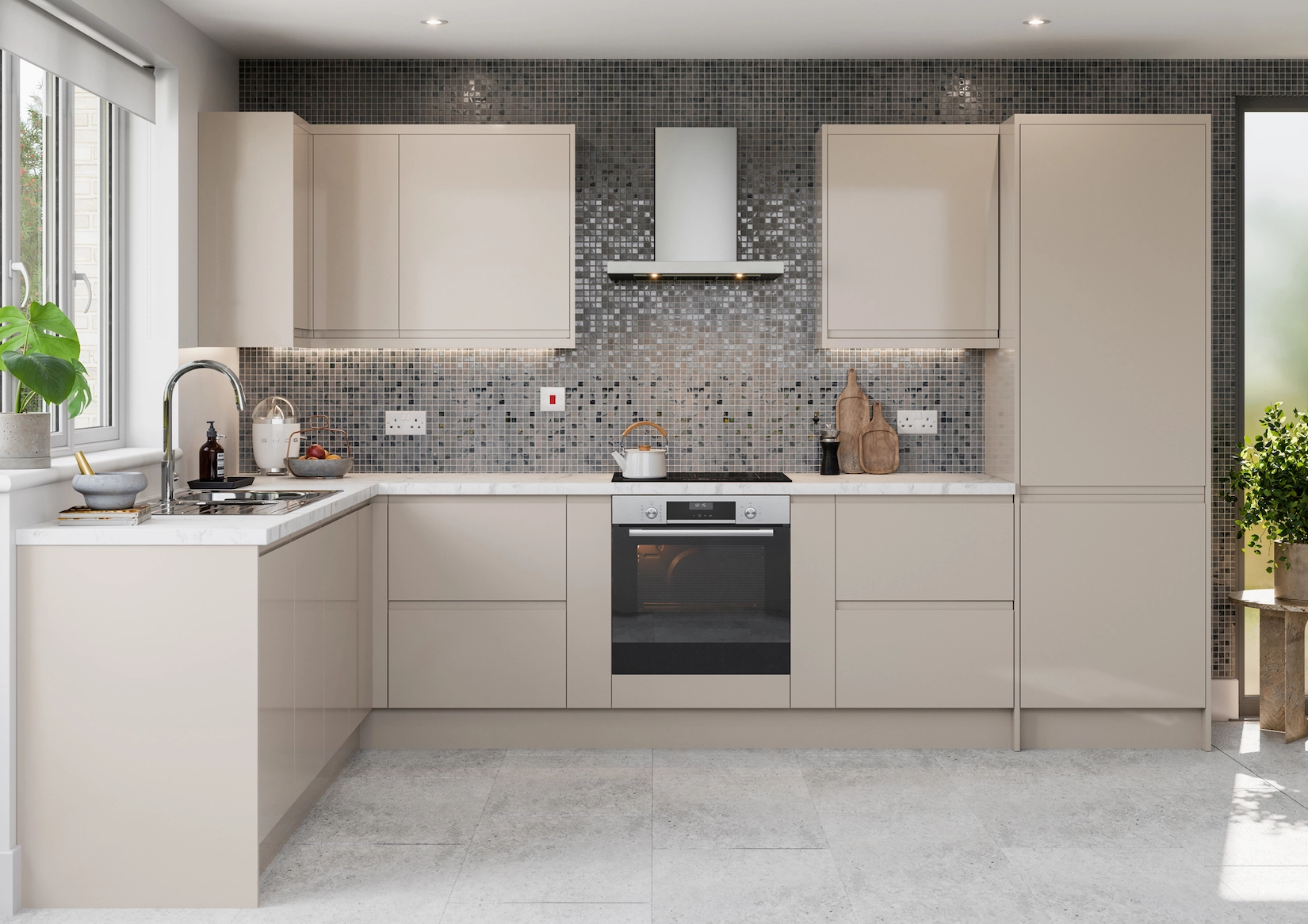 Cream handleless kitchen with mosaic tiled splashback