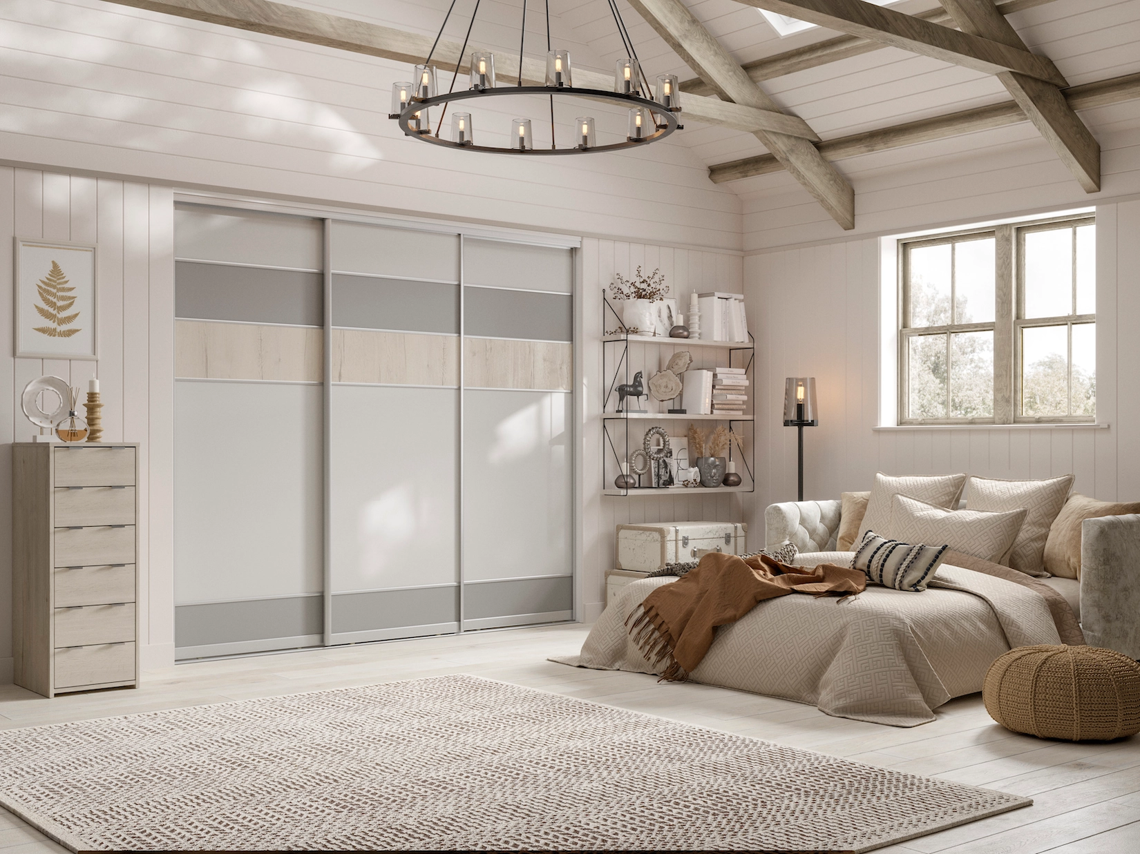 Sliding wardrobe doors in a loft bedroom with exposed beams