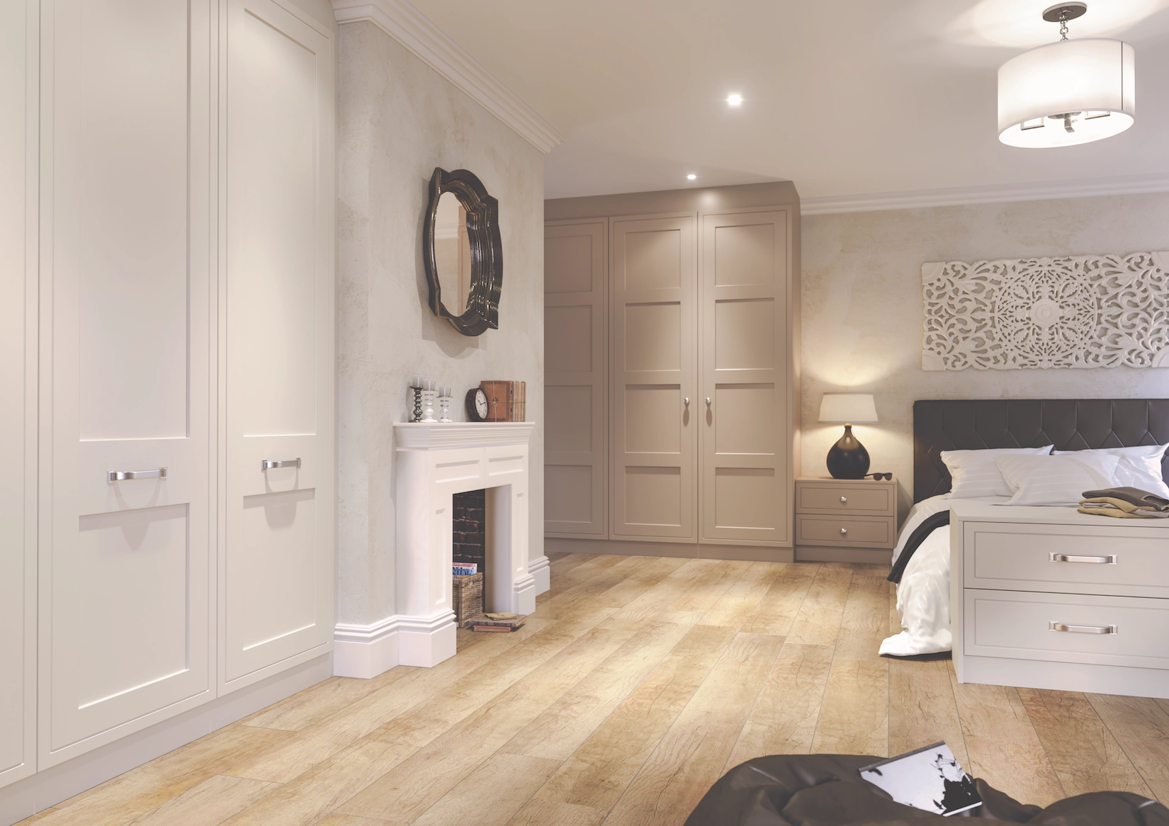 Bedroom with fitted wardrobes either side of a fireplace
