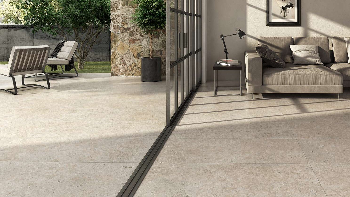 Indoor outdoor porcelain paving with sliding glass doors