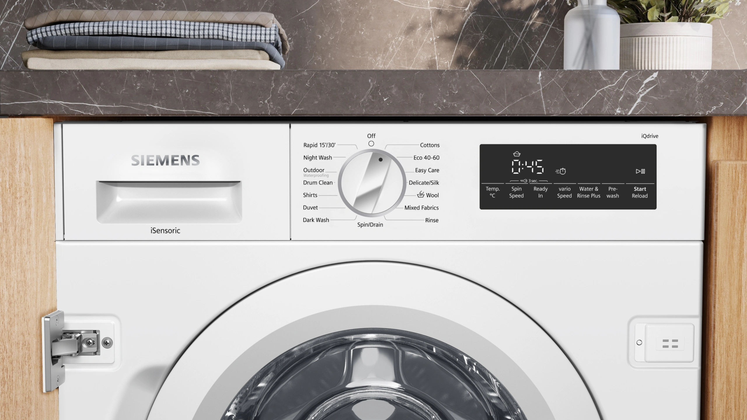 Integrated washing machine in fitted utility cabinetry