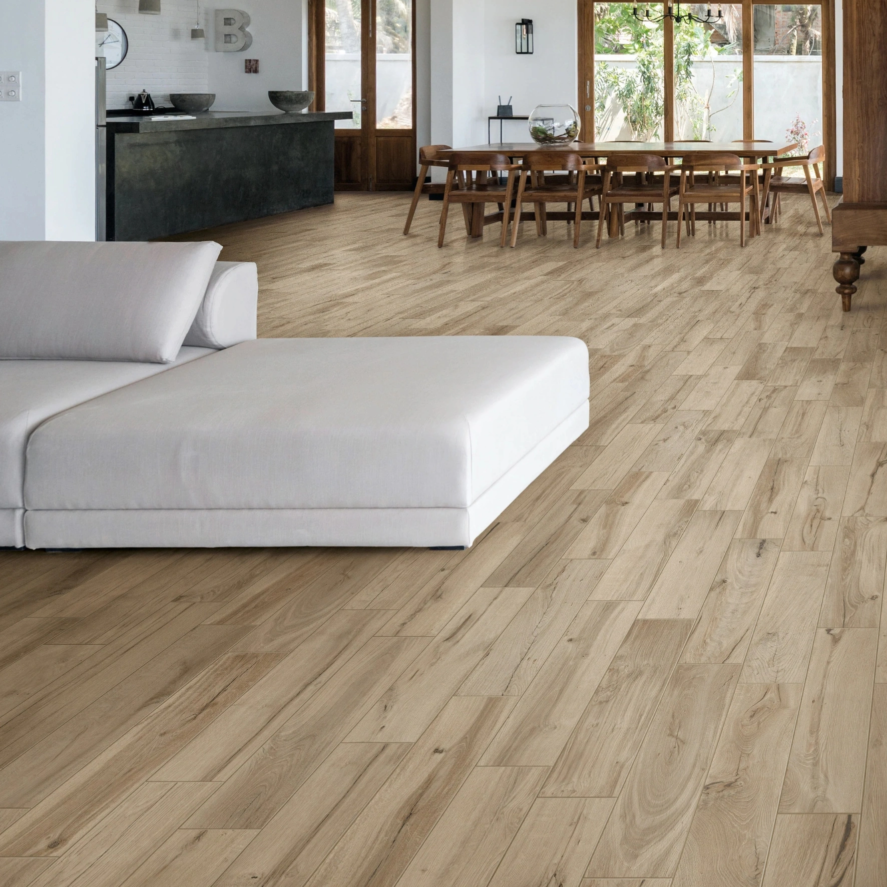 Light oak effect flooring in an open plan living space