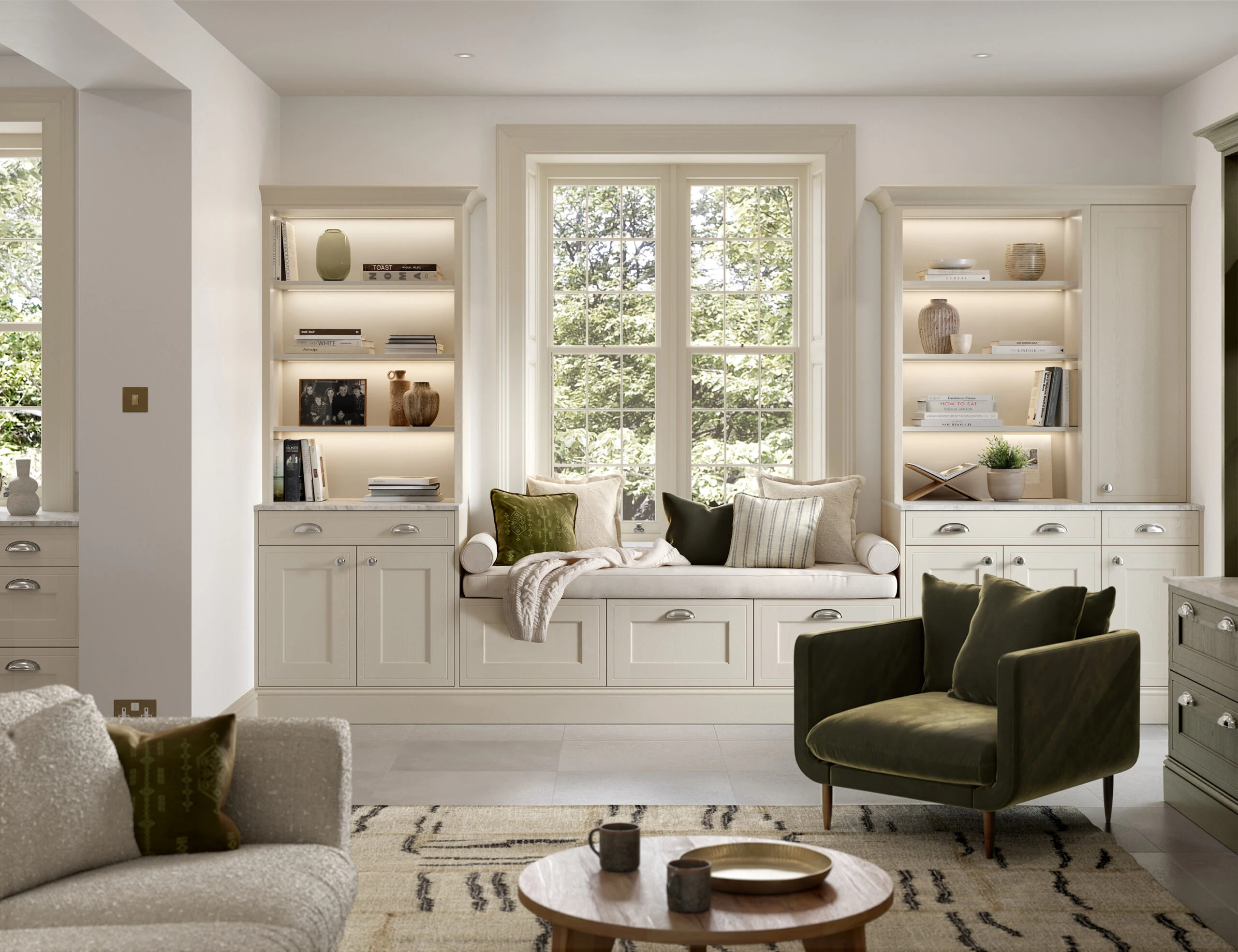 Living room with fitted alcove shelving and window seat