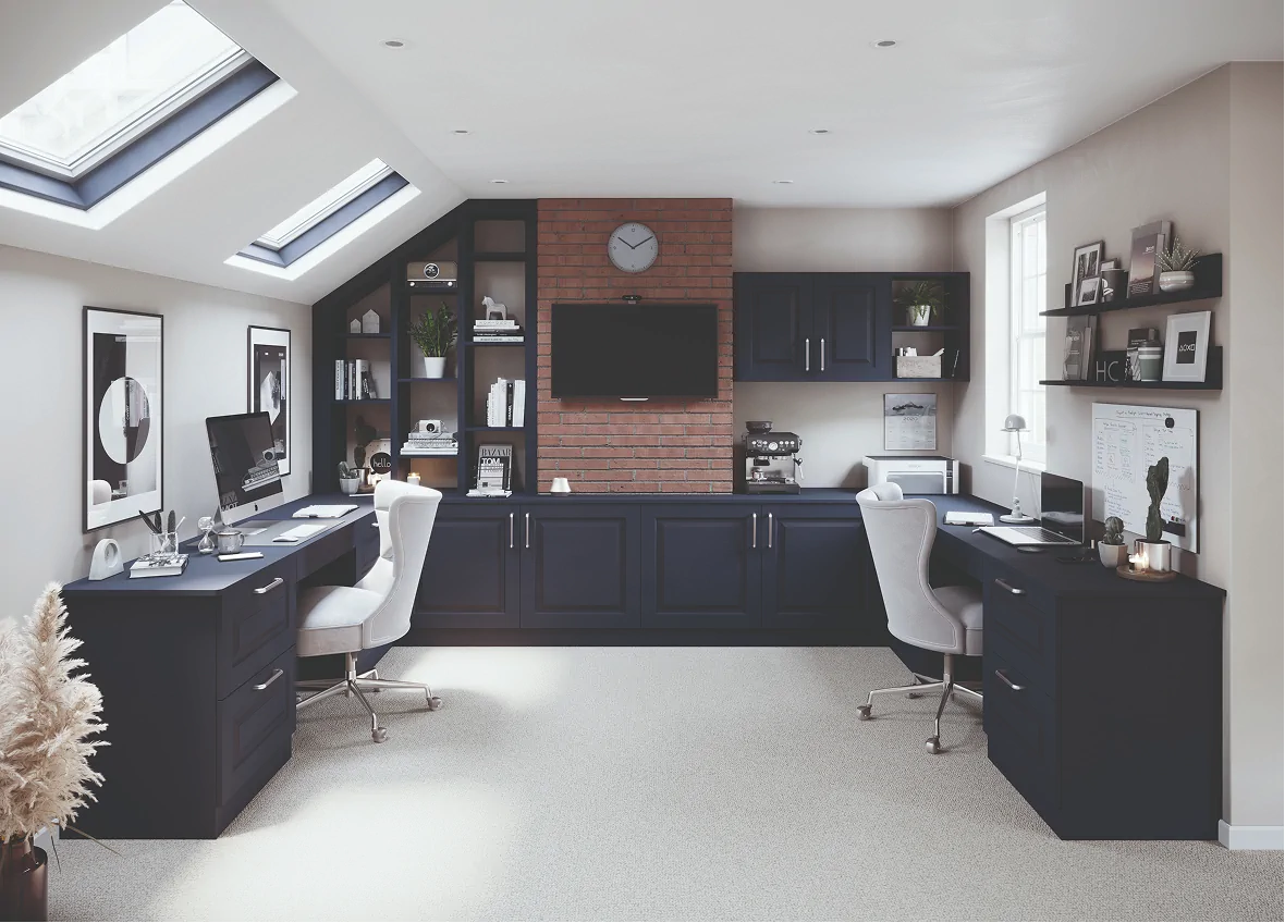 Loft home office with fitted dark cabinetry and twin desks
