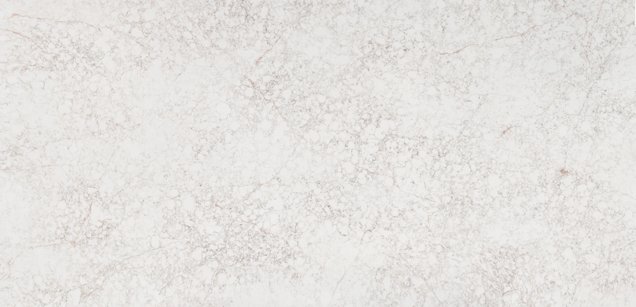 Pale textured stone worktop surface