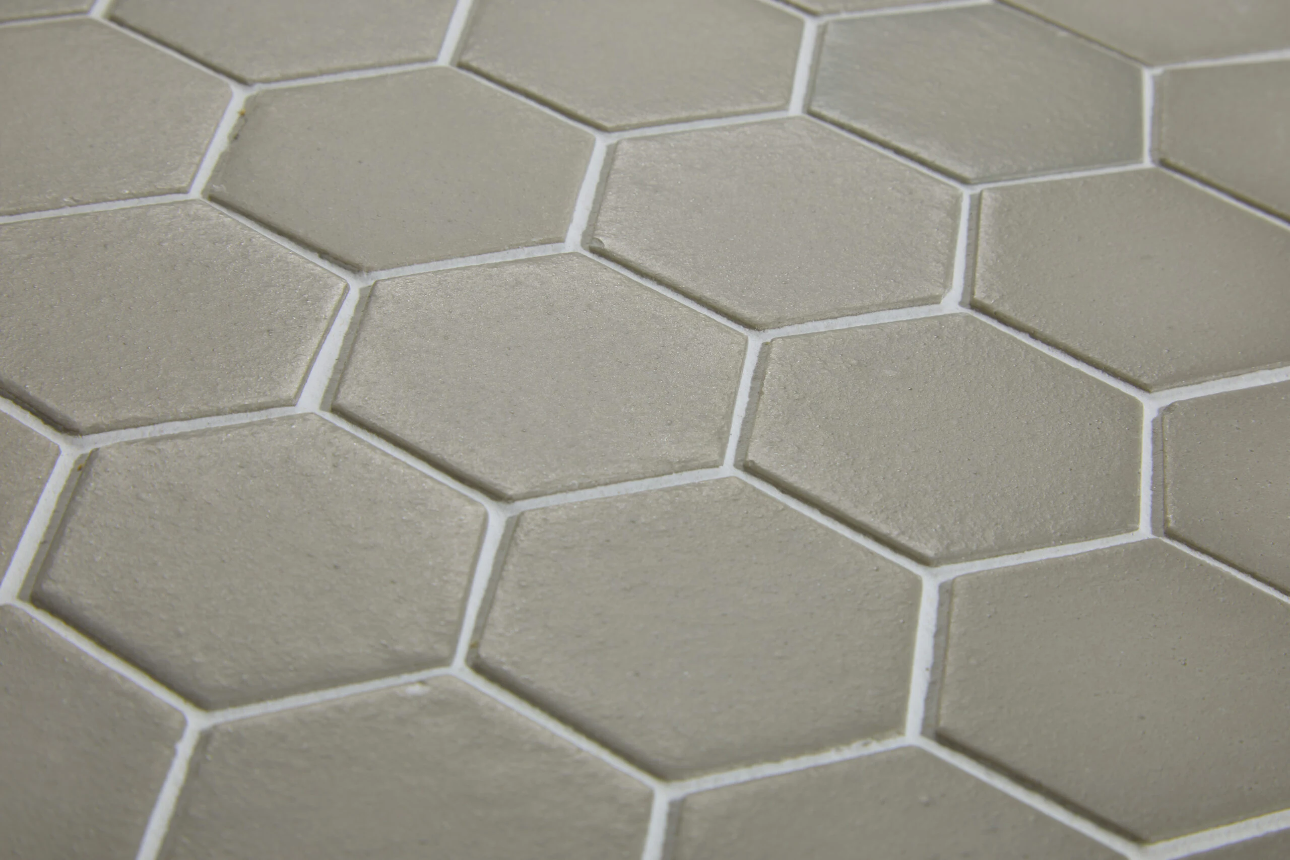 Sage green hexagonal wall tiles